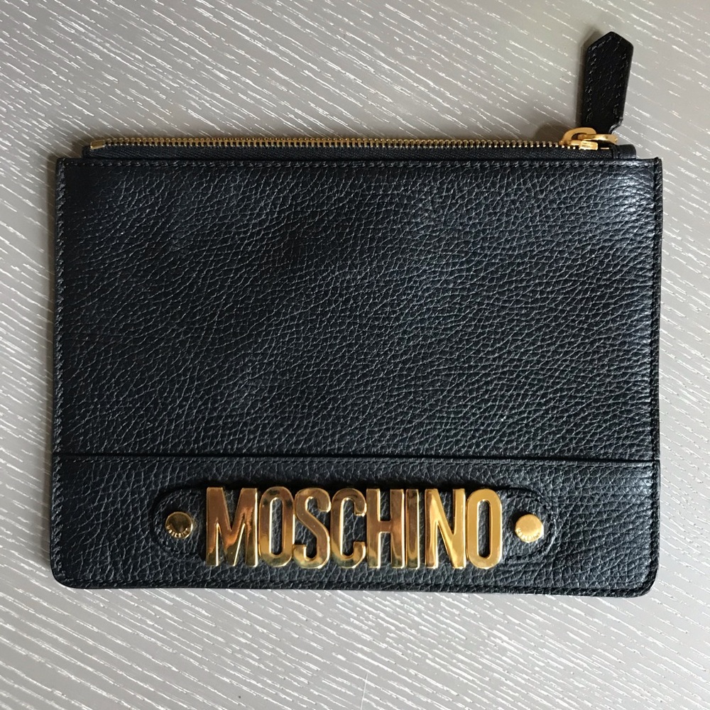 Authentic MOSCHINO leather clutch.
